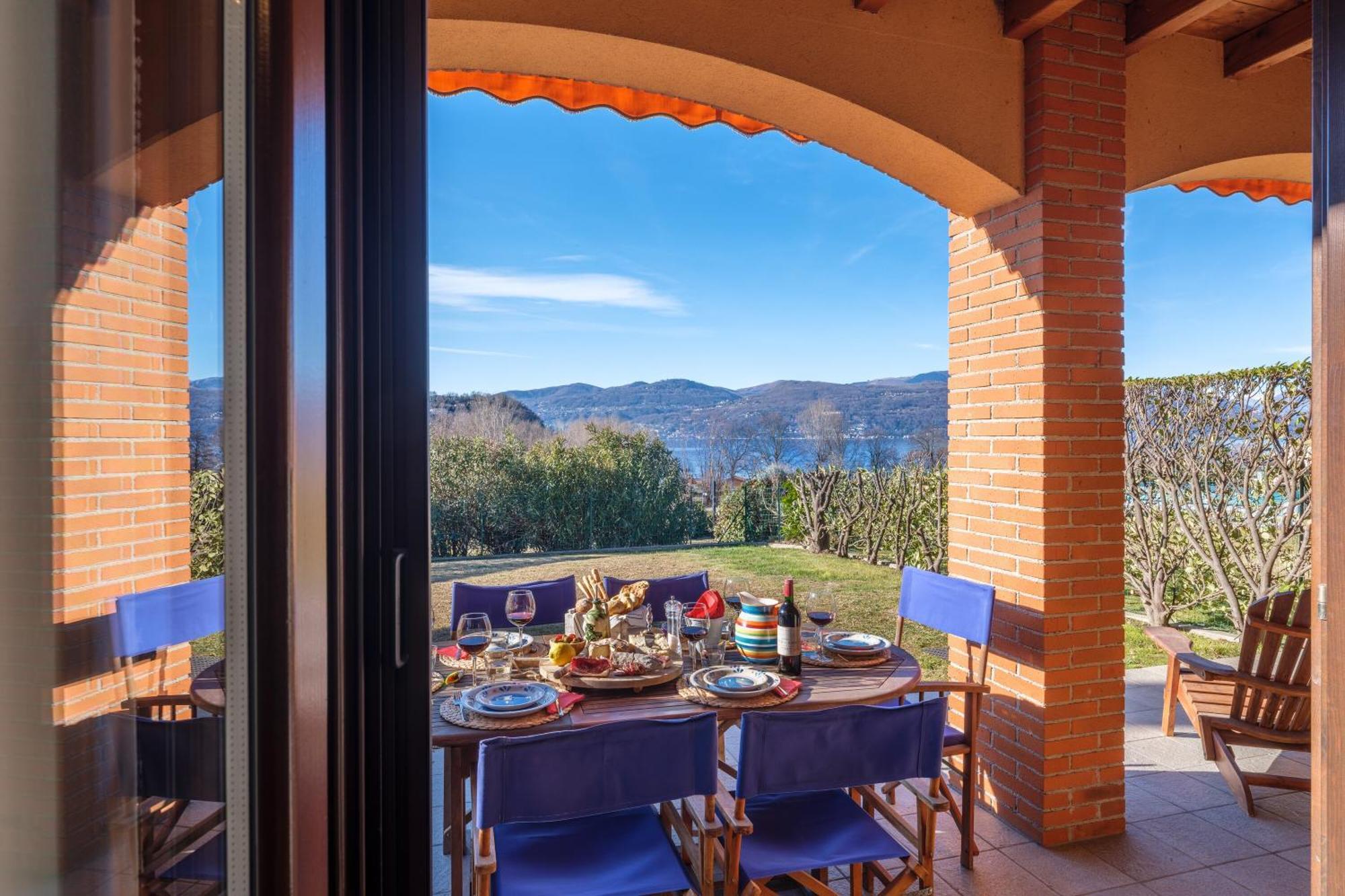 La Luna Nel Lago Lake View Garden - Happy Rentals Испра Экстерьер фото